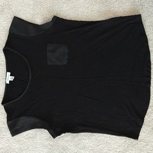 A Calvin Klein black dressy T-shirt size Large